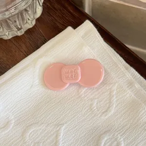 Pink acetate hair clip, exquisite bow side hairpin detail for elegant daily styling.