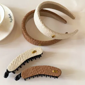 Woven headband and banana hair clip set with gold tone metallic accents for elegant hairstyles.