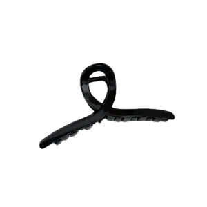 Minimalist black hair claw clip for women, large stylish hairpin for thick hair shower styling.