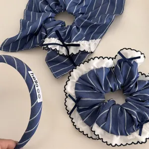 Navy blue striped hair scrunchies and headband set with lace bow design for daily cute hair styling.