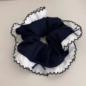Dark blue hair scrunchie with white lace ruffle and cute bow, sweet style ponytail holder.