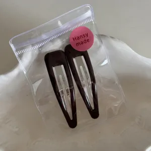Dunkelbraune Kaffee-Clip-Haarspangen 2er-Set in Klarsichttüte, süße Pony-Haaraccessoires.