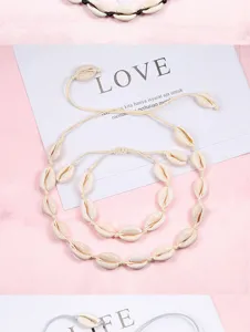 Ensemble de bijoux de coquillages tissés à la main haïtiens collier bracelet de plage.