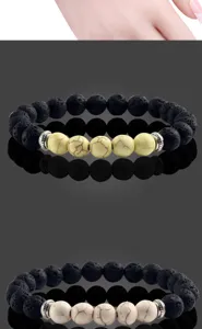Vulkan-Lavastein und Türkis Perlenarmband mit silbernen Zwischenperlen, Energieschmuck.