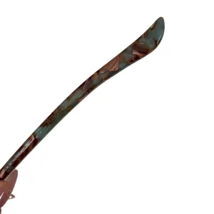 Elegant cellulose acetate hair stick with unique marbled pattern, minimalist hair fork accessory.