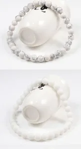 Close-up detail shot of white turquoise crackle and matte porcelain bead bracelets, 6mm.