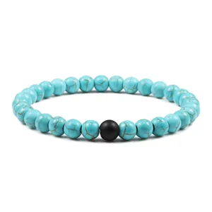 Bracciale di perline turchesi boho con pietra centrale nera opaca per uomo donna e coppie