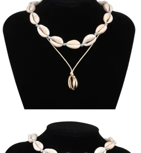 Koranischer Stil doppelreihige Muschel Choker Halskette mit goldenem Anhänger Modeschmuck.