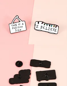 Creative enamel pin set featuring funny text design, metal brooch badge for jackets and bags.