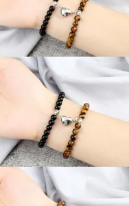 Set di bracciali di coppia magnetici con perline nere e occhio di tigre, chiusura magnetica a cuore.