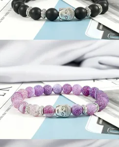 Lavastein und Achat Perlenarmbänder mit silbernen Buddha Kopf Anhängern und Abstandhaltern.