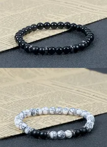 Gedetailleerd overzicht van natuurstenen kralenarmbanden set met metalen afstandsbanden voor unisex.
