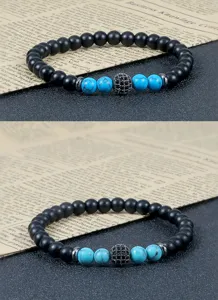 Mannen vrouwen kralen armband set zwart mat steen turkoois pave bal sieraden detail foto