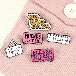 Creative enamel pin badge set featuring quote designs, metal alloy brooch for clothing decor.