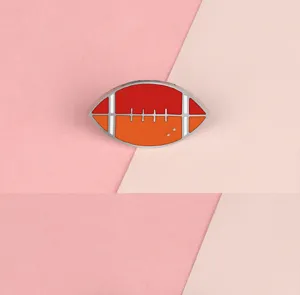 Rugby ball alloy brooch mini enamel pin for denim jackets and student clothing accessories.