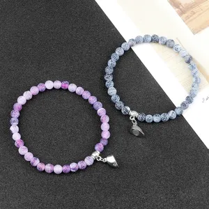 Set bracciali di coppia in pietra magnetica con ciondolo cuore regalo di gioielli