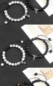Handmade magnetic couple bead bracelet set featuring natural stone and woven cord design.