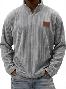 Men's vintage corduroy half-zip stand collar pullover sweater in gray with leather patch detail.