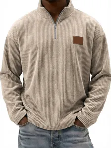 Men's vintage corduroy quarter-zip polo sweatshirt fabric and chest patch detail view.