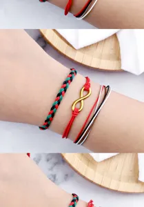 Gedetailleerd overzicht van meerlaagse geweven armbanden met oneindigheidssymbool en koorden.
