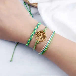 Set di braccialetti dell'amicizia intrecciati a mano con ciondolo albero per donna e uomo.