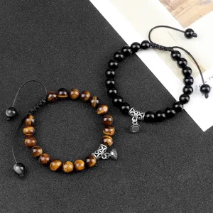 Handmade beaded couple bracelets set with magnetic attraction design. Tiger eye and black beads.