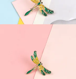 Exquisite detail view of the vibrant enamel dragonfly brooch, elegant jacket collar pin charm.