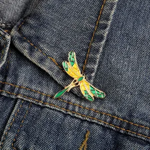 Exquisite dragonfly enamel brooch pin featuring vibrant green and yellow colors for collar decor.