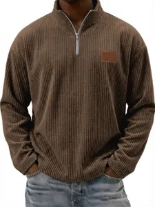 Brown corduroy quarter-zip mock neck pullover shirt detail showcasing textured fabric.