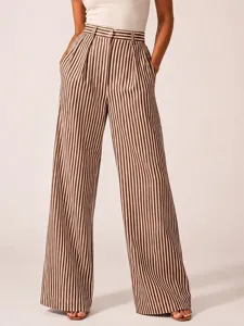 Striped wide-leg trousers detail shot, high waist design, relaxed fit casual style.