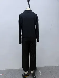 Detailed back view of solid mock neck sweatshirt and wide leg pants casual tracksuit set.