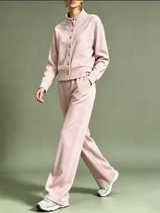 Casual pink lounge set featuring a stand-collar buttoned cardigan and wide-leg trousers.