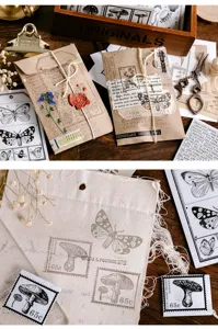 Vintage dagboek DIY knutselset met botanische stempels, stickers en retro decoratieve enveloppen.