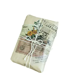 Confezione di carta washi decorativa con adesivi in stile giornale inglese vintage per bricolage.