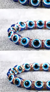 Detailopname van het boze oog kristal kralen armband, 10mm blauwe strass yoga sieraden.