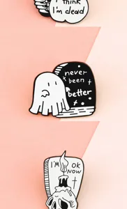 Goth spooky cartoon enamel pin detail featuring cute ghost and skull design elements.