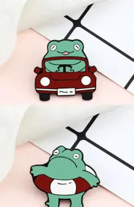 Cute cartoon frog enamel pin detail shot, vibrant green animal badge for backpack decoration.