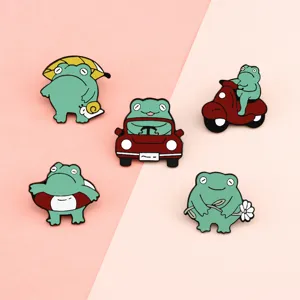 Cute green frog enamel pin set, cartoon animal lapel badges for backpacks, jackets, and hats.