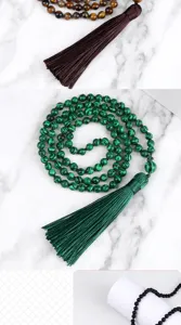 Largo collar de cuentas con borla mala cuentas de oración pulsera multicapa detalle.