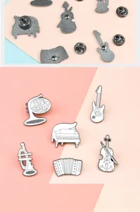 Mini musical instrument enamel pin set featuring piano guitar violin trumpet accordion brooches.
