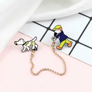 Cute metal cartoon person walking dog brooch pin set for backpacks and clothing decoration.