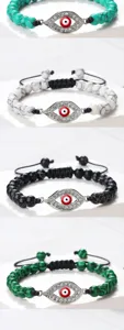 Bracelet de perles mauvais œil avec charm strass et corde tressée pour femmes et hommes chic.