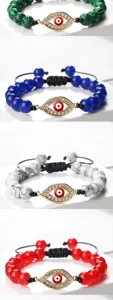 Bracelet de perles oeil turc, cordon tresse reglable avec pendentif en metal strass.