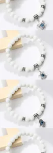 Bracelet de perles blanches avec breloques mauvais oeil papillon tortue bijoux yoga