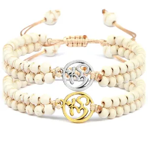 Bracelet tressé double couche fait main en perles de turquoise blanche avec symbole Om.