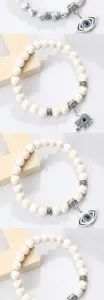 Bracelet de perles blanches bohème avec pendentif mauvais œil bijoux vintage argentés cadeau