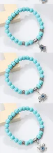 Bracelet de perles turquoise avec pendentif mauvais œil, style bohème bijoux de yoga détail.