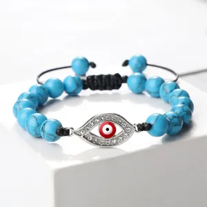 Bracelet en perles turquoise bleue avec strass breloque mauvais œil cordon réglable