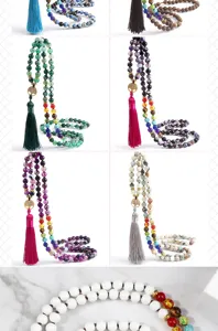 Details of multi-layer gemstone beaded long necklaces with tree of life charms & tassels.