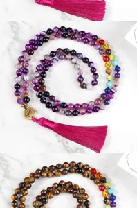 Beaded gemstone necklace with pink tassel and tree of life pendant for stylish daily wear.
